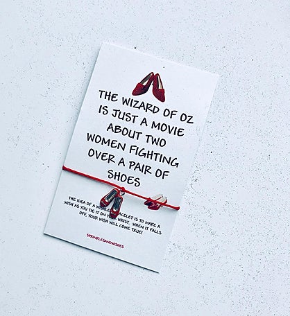 Two Women Fighting Over A Pair Of Shoes Wish Bracelet