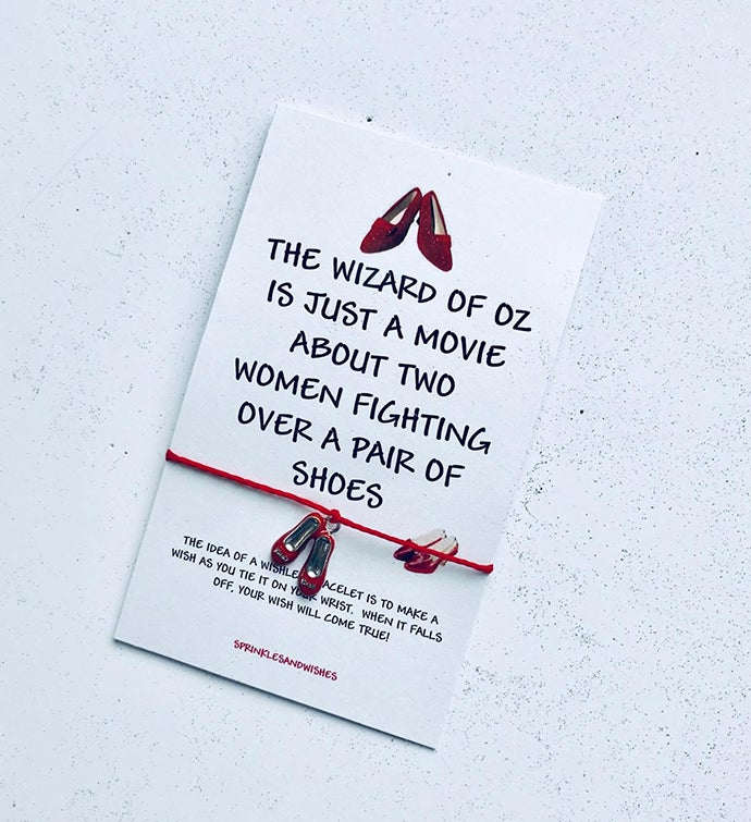 Two Women Fighting Over A Pair Of Shoes Wish Bracelet