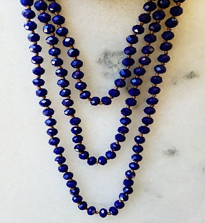 Royal Blue Crystal Necklace Delicately Spaced With Decorative Knot