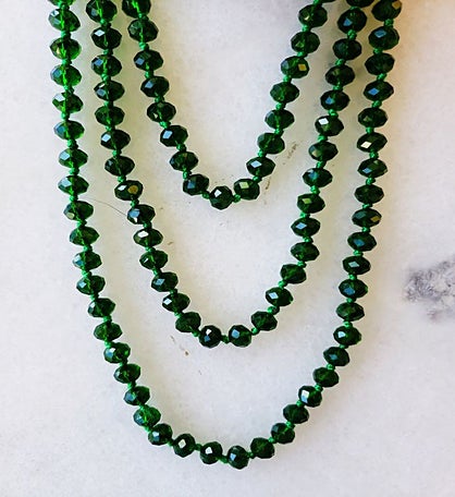 Green Crystal Necklace  Delicately Spaced With Decorative Knot