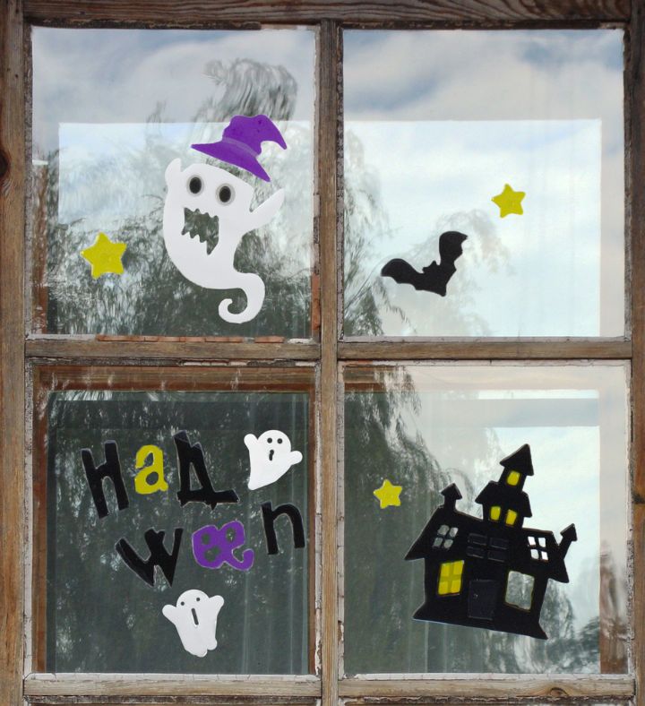 15 piece Purple And Black Haunted House Halloween Gel Window Clings