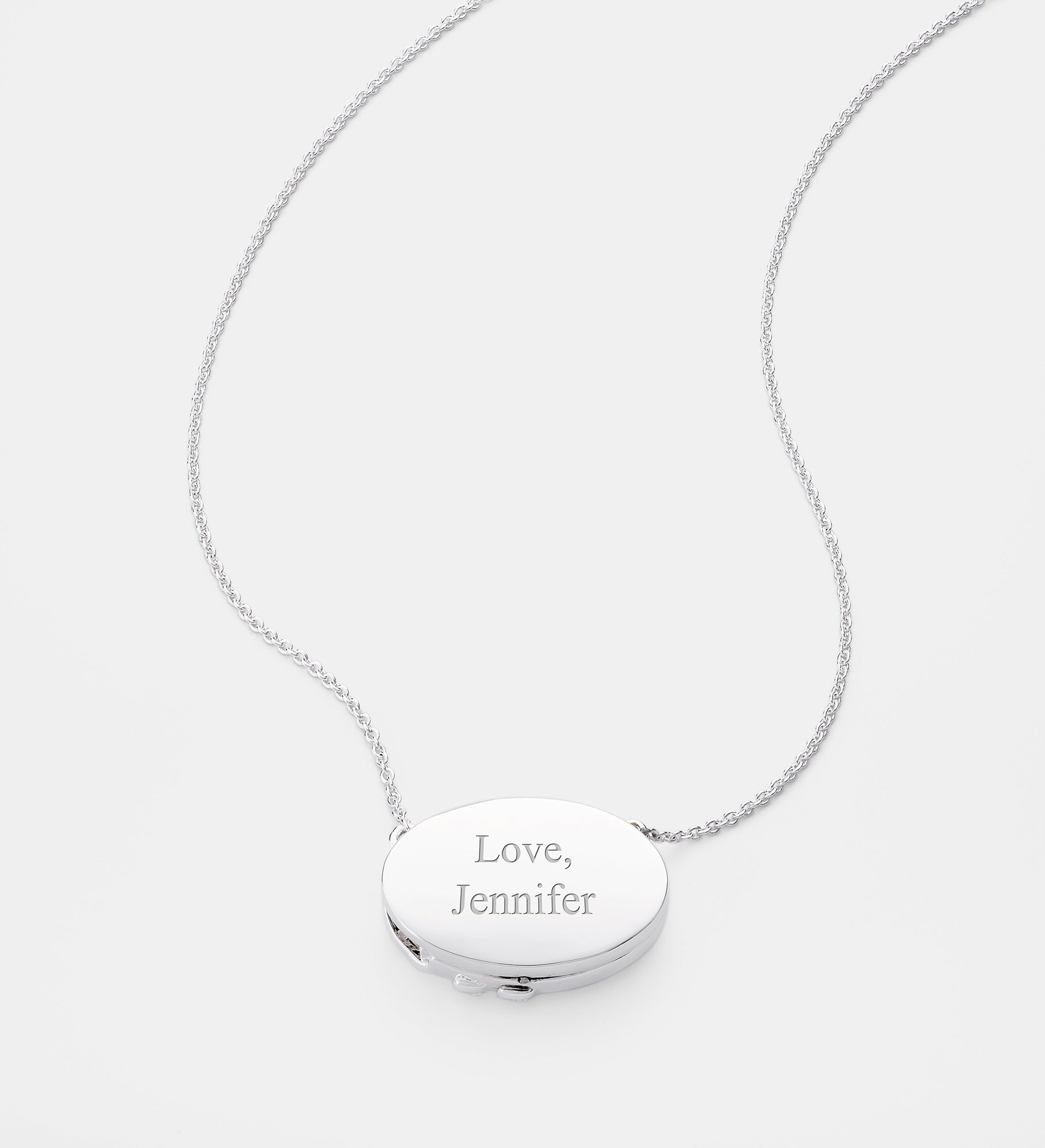 Kittenish Engraved Floral Oval Sliding Locket